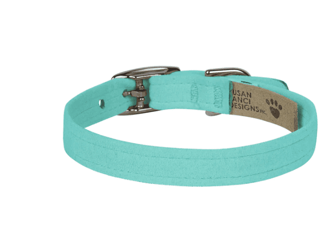 A dog collar in turquoise color with a metal buckle, designed for pet fashion and comfort, ideal for stylish and secure pet accessories.